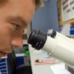 people-scientist-microscope-white
