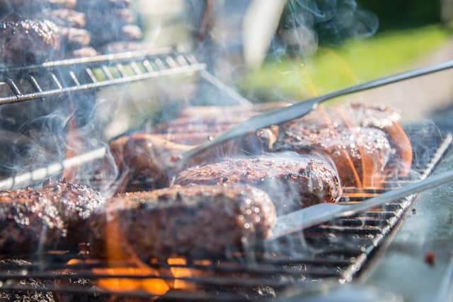 close-photography-of-grilled-meat-on-griddle