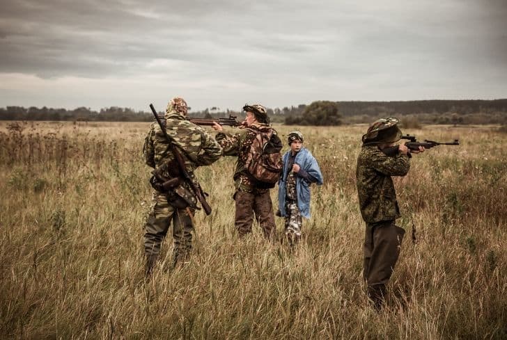 group-of-men-hunting-poaching